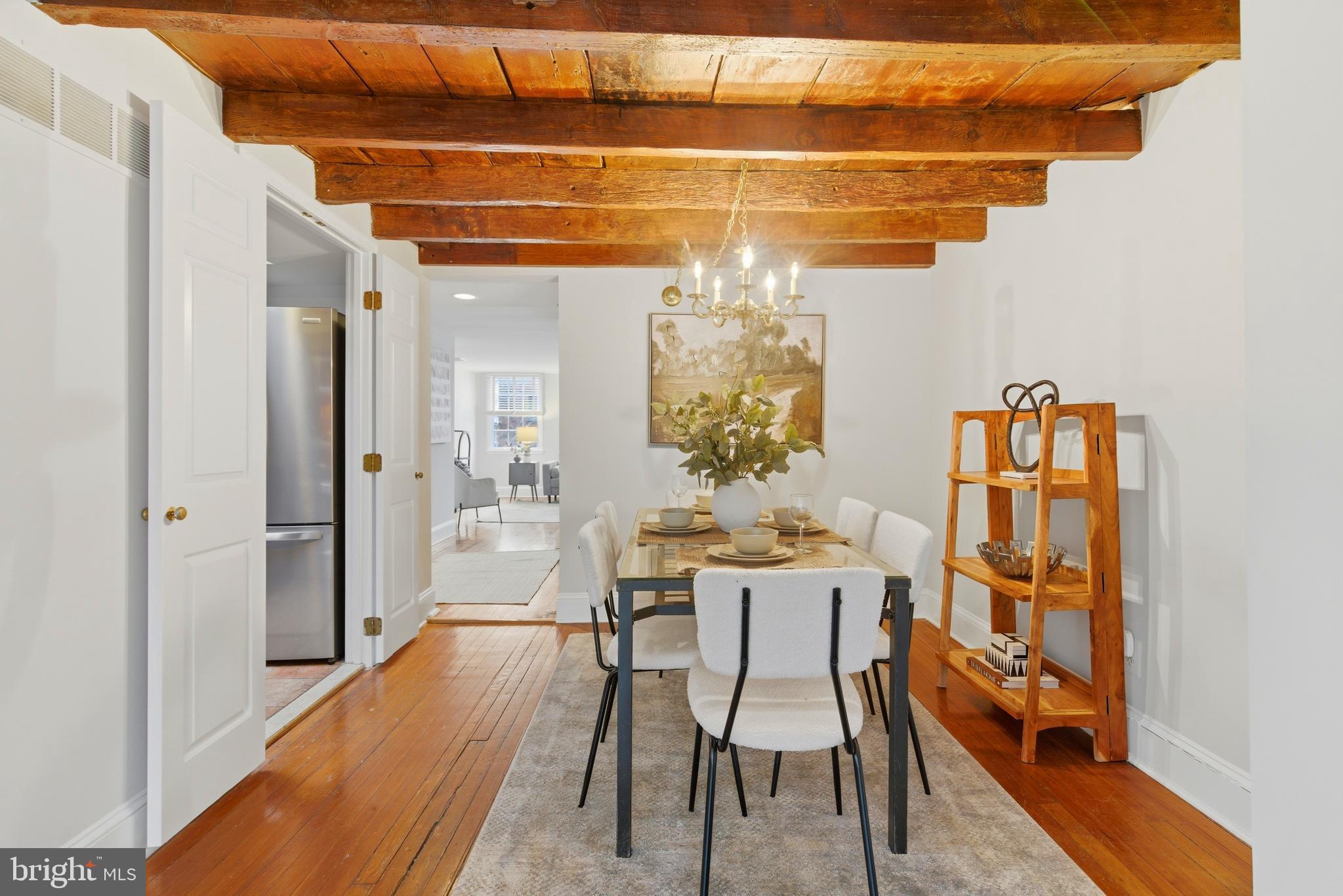 2719 Dumbarton Street Northwest Washington, DC 20007 - Photo 10 of 32 a dining room with furniture and chandelier kitchen view