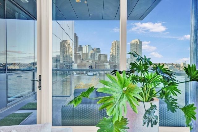 a view of a potted plants next to a road