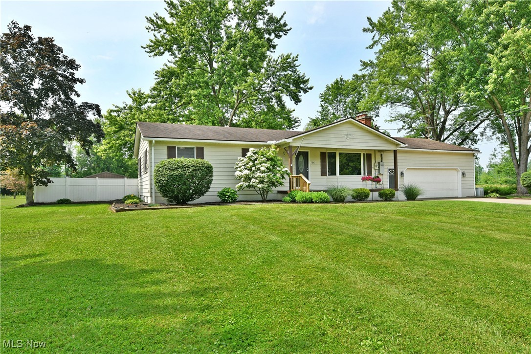 2847 Selkirk Bush Road Warren, OH 44481 - Photo 2 of 47 Single story home with a garage, a chimney, and driveway