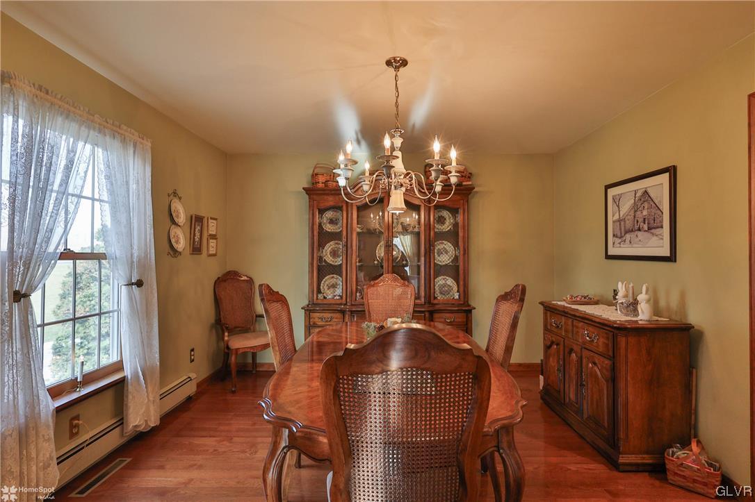 193 Nolf Road Nazareth, PA 18064 - Photo 15 of 47 a view of a dining room with furniture and chandelier