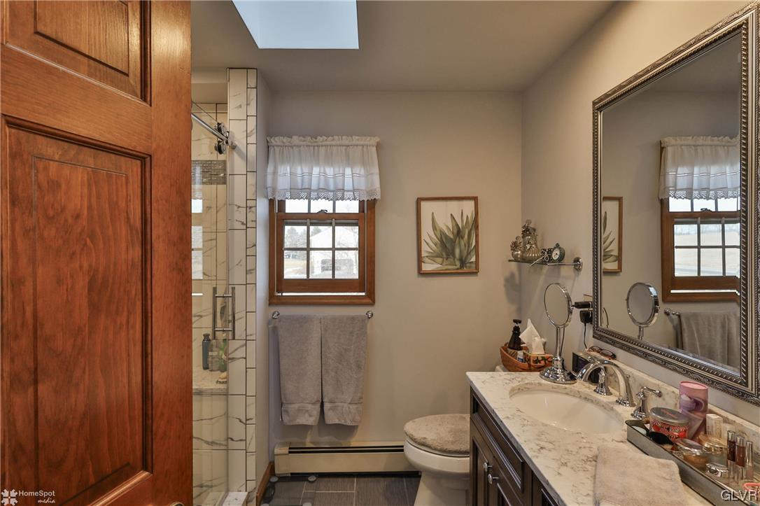 193 Nolf Road Nazareth, PA 18064 - Photo 31 of 47 a bathroom with a granite countertop sink toilet and shower