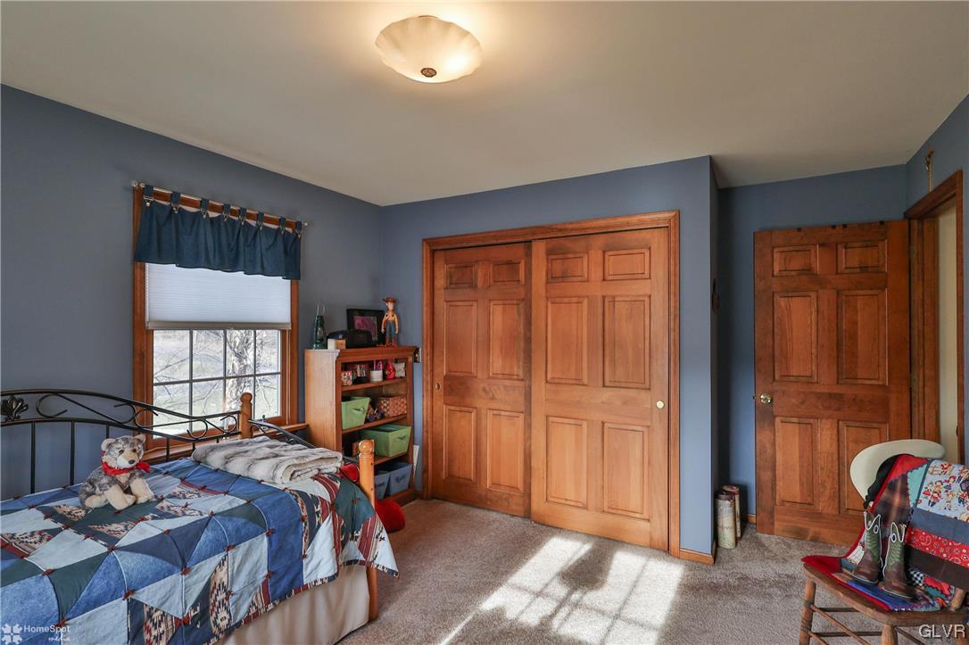 193 Nolf Road Nazareth, PA 18064 - Photo 41 of 47 a bed sitting in a bedroom next to a window