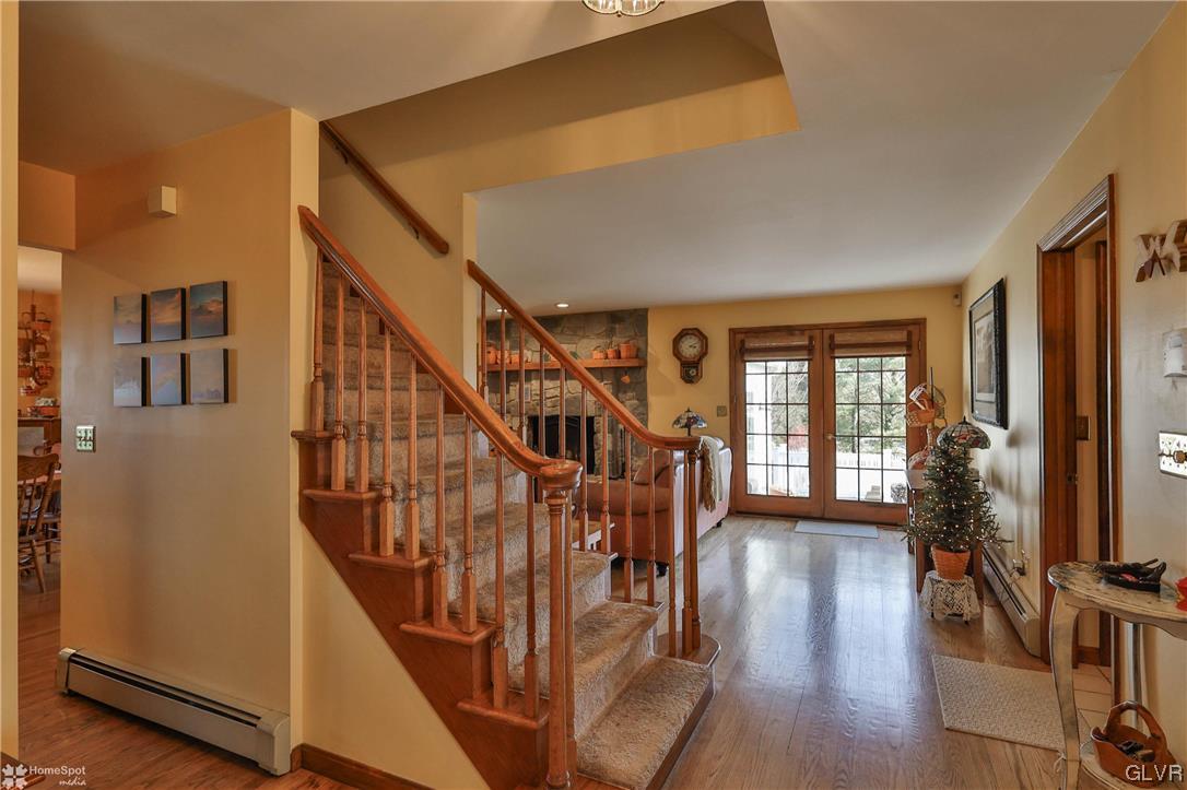 193 Nolf Road Nazareth, PA 18064 - Photo 5 of 47 a view of entryway with wooden floor and stairs