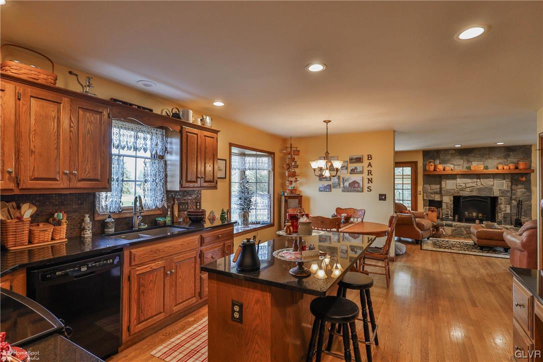 193 Nolf Road Nazareth, PA 18064 - Photo 8 of 47 a very nice looking open dining room with kitchen island furniture a chandelier and a view of kitchen