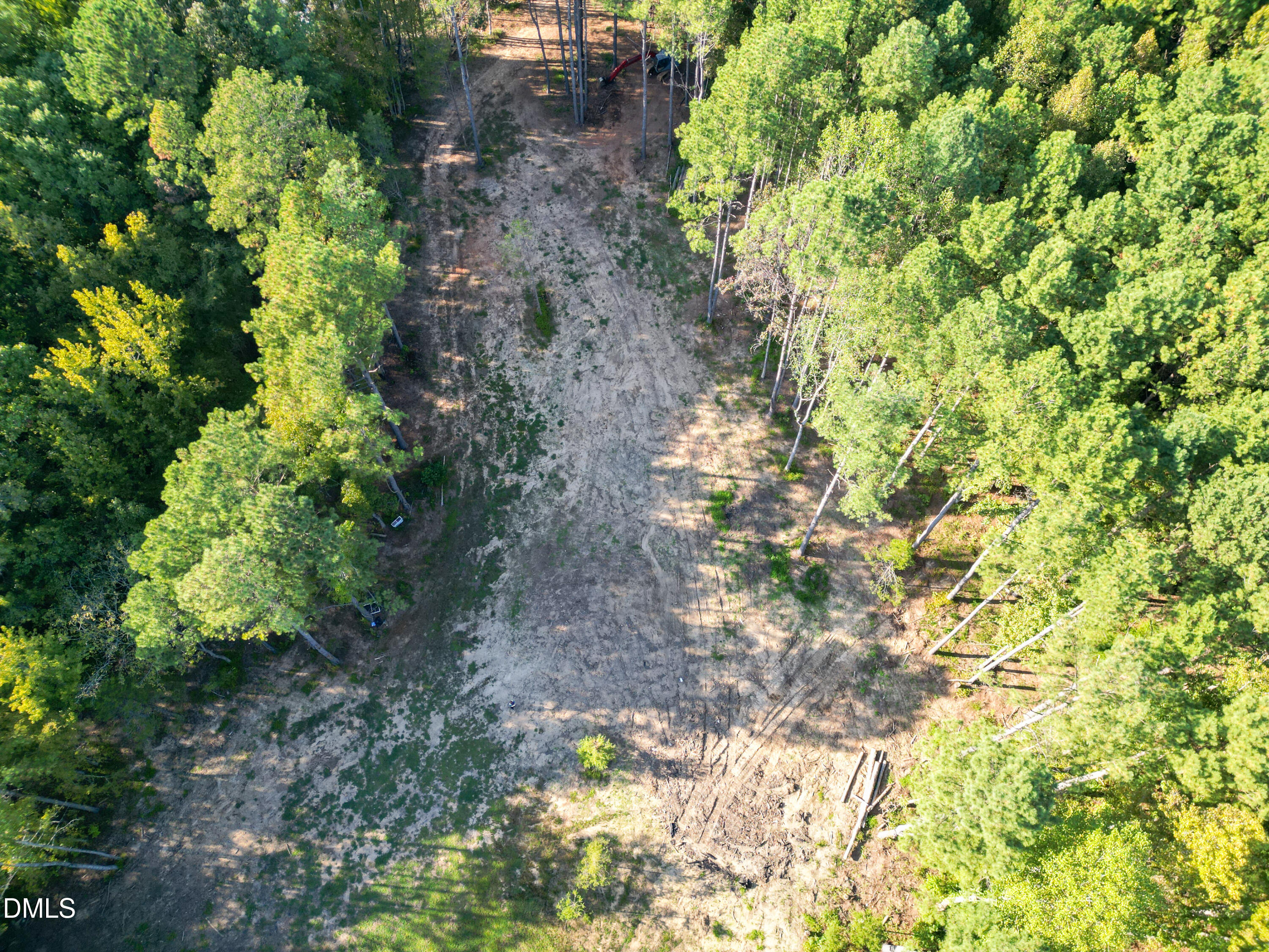 708 Tollie Weldon Road Henderson, NC 27537 - Photo 23 of 31 a backyard of a house with lots of green space