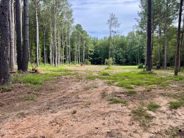 a house with yard in front of it