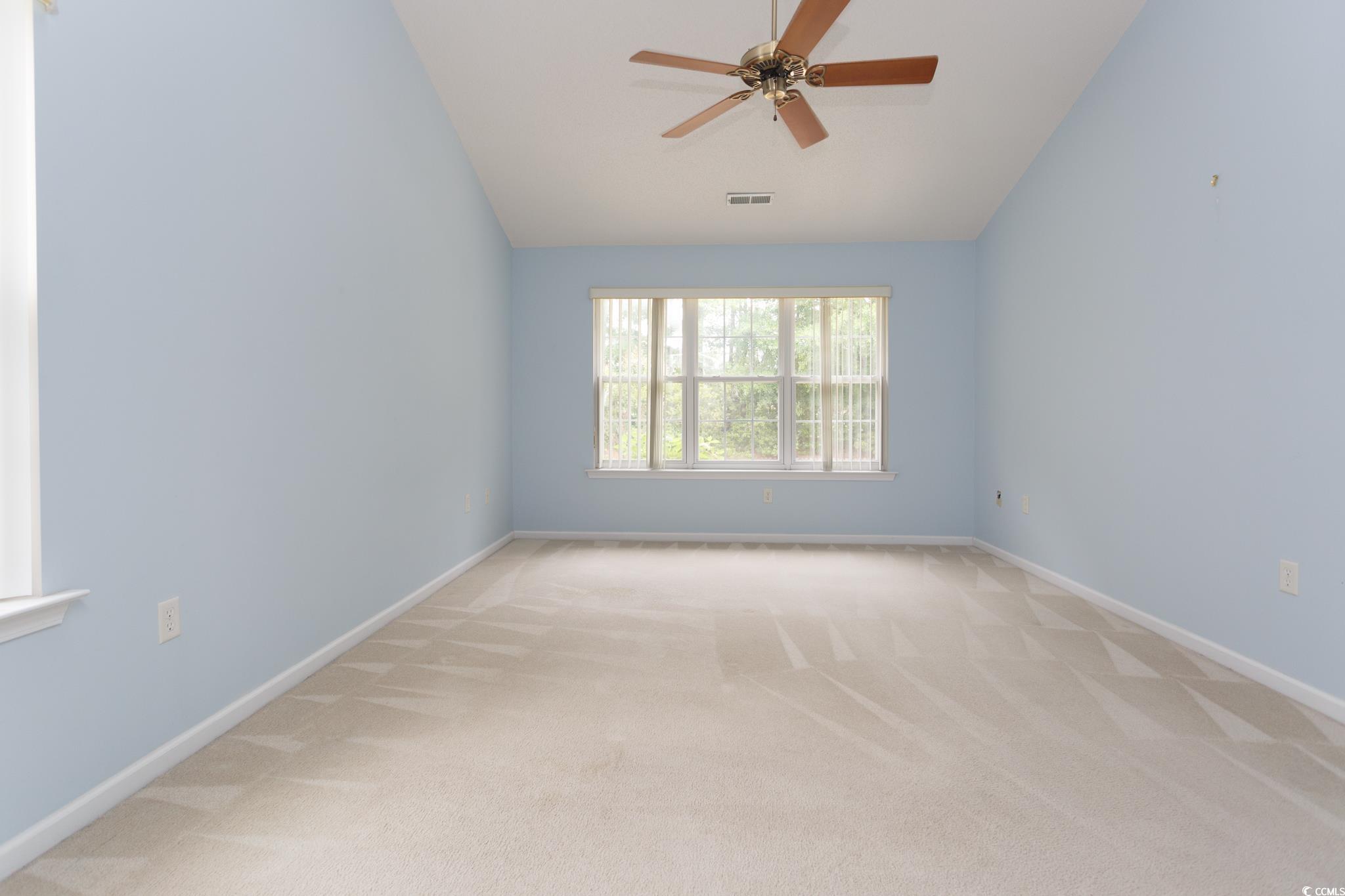 1044 Vestry Drive Murrells Inlet, SC 29576 - Photo 13 of 40 Unfurnished room featuring vaulted ceiling, light