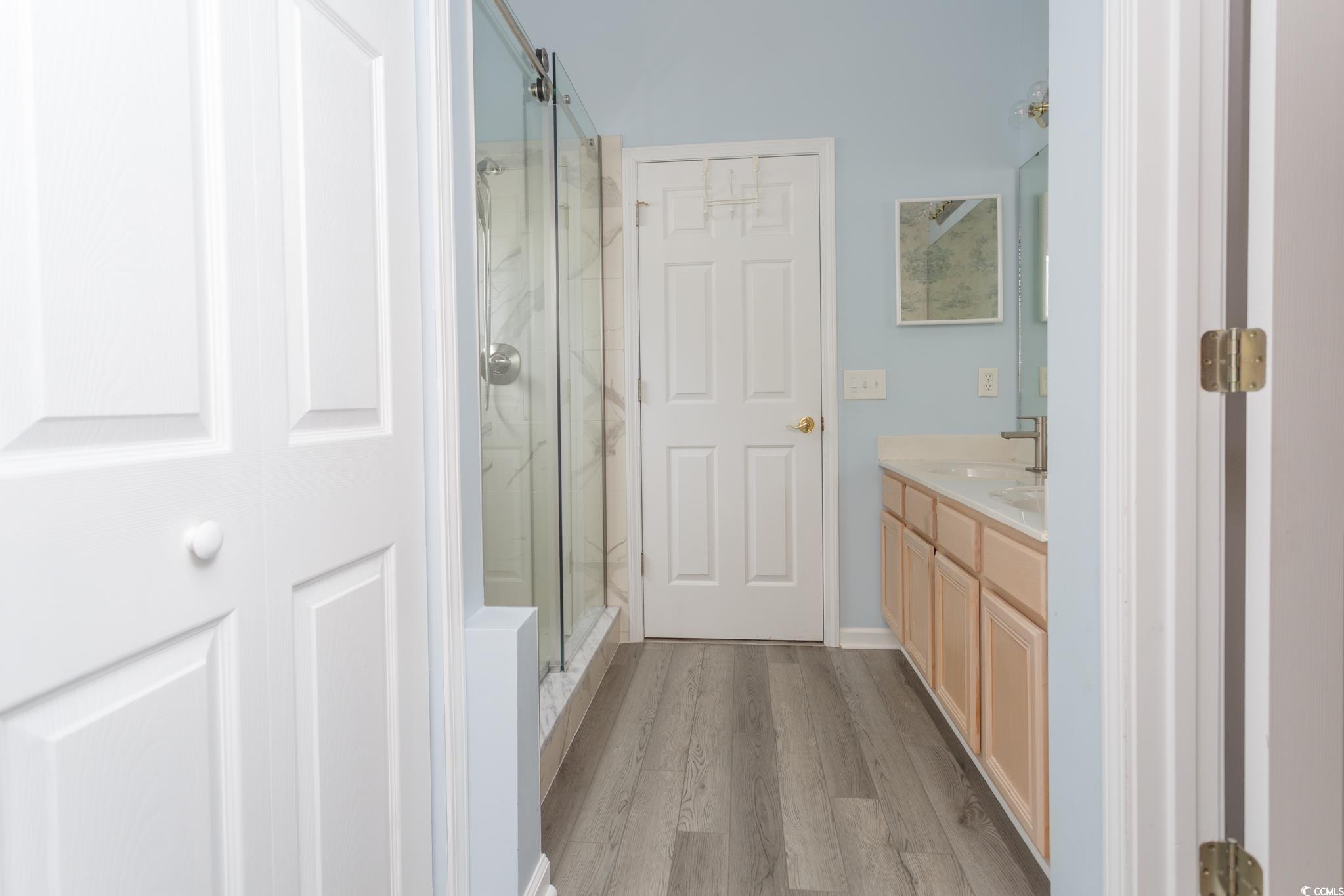 1044 Vestry Drive Murrells Inlet, SC 29576 - Photo 15 of 40 Bathroom featuring a marble finish shower, vanity,
