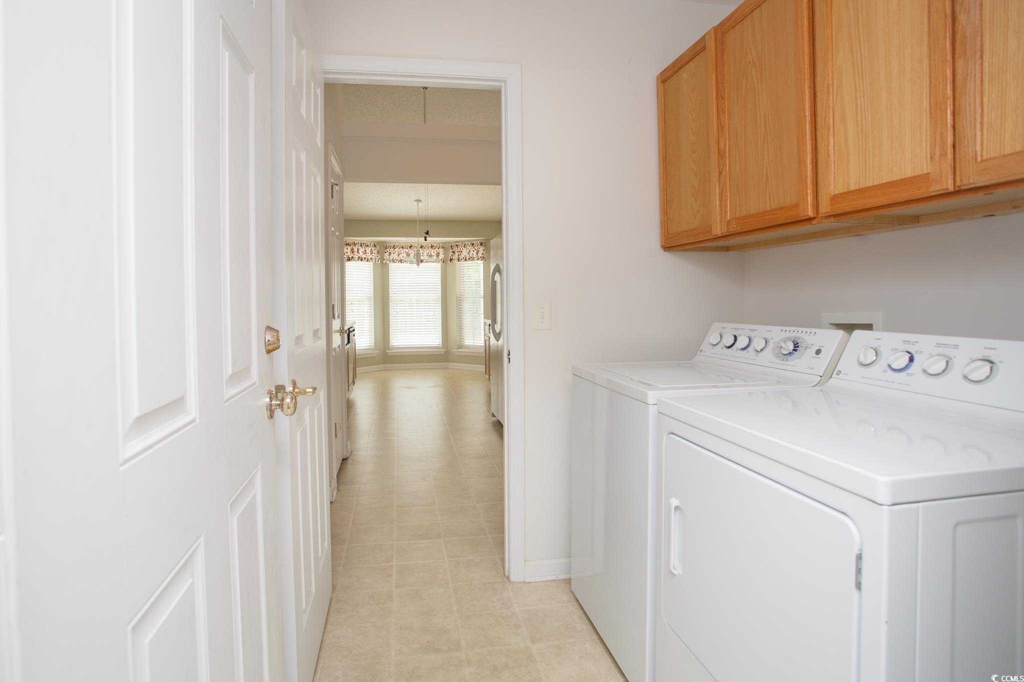 1044 Vestry Drive Murrells Inlet, SC 29576 - Photo 28 of 40 Clothes washing area with cabinet space, washing m