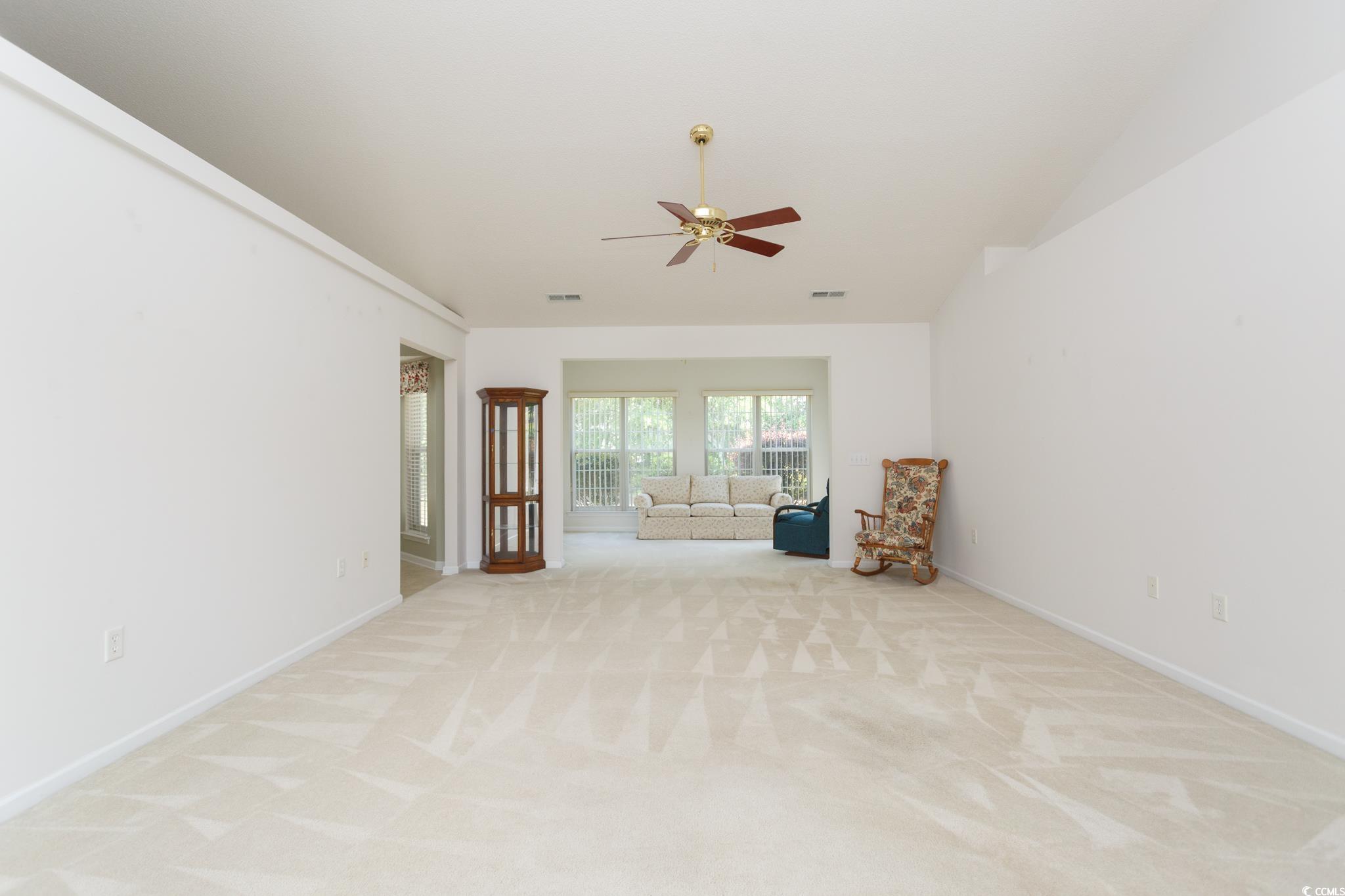1044 Vestry Drive Murrells Inlet, SC 29576 - Photo 5 of 40 Unfurnished room featuring a ceiling fan, light co