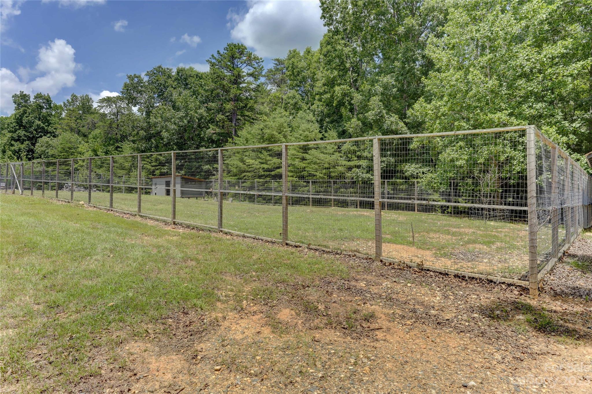 2354 Vineyard Road Fort Mill, SC 29708 - Photo 20 of 48 a view of a yard with wooden fence