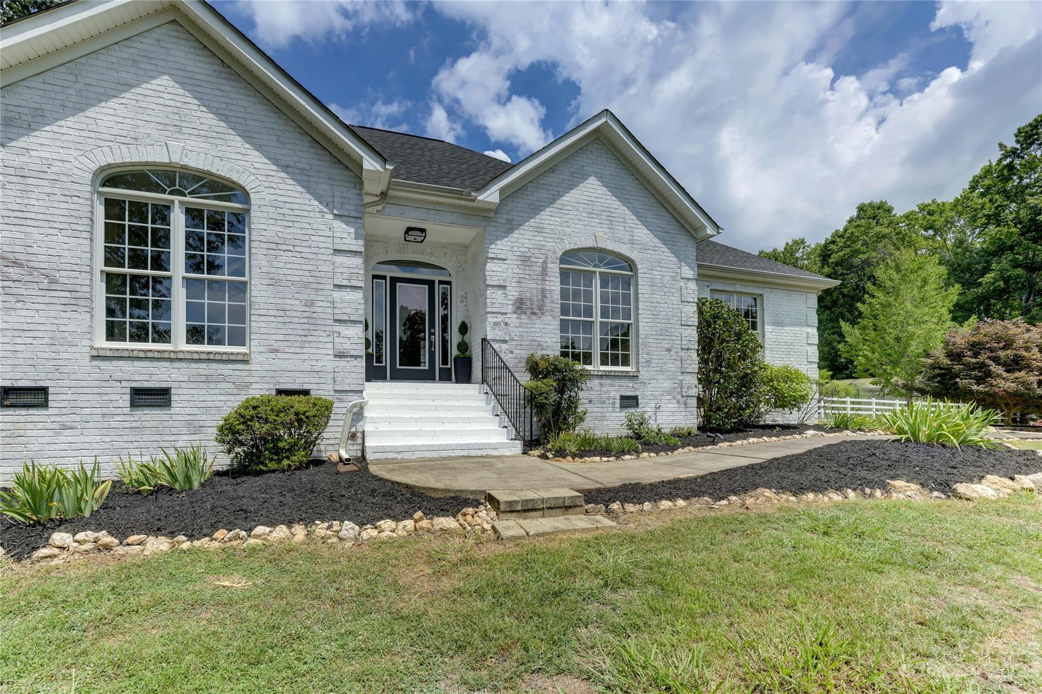 2354 Vineyard Road Fort Mill, SC 29708 - Photo 26 of 48 a front view of a house with a yard