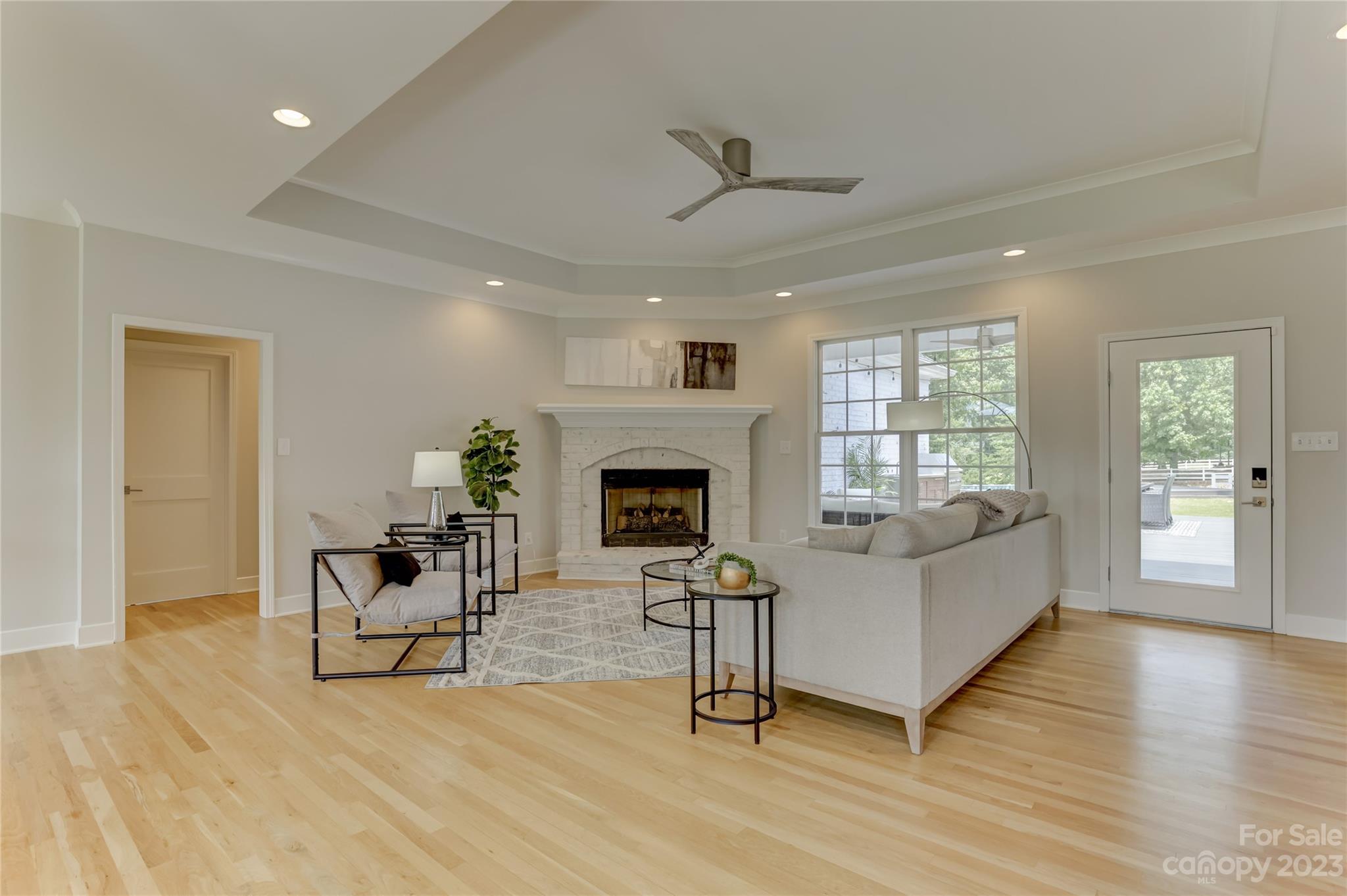 2354 Vineyard Road Fort Mill, SC 29708 - Photo 29 of 48 a living room with furniture and a fireplace