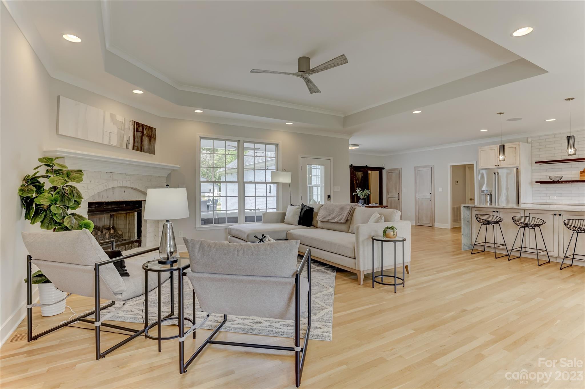 2354 Vineyard Road Fort Mill, SC 29708 - Photo 30 of 48 a living room with furniture and a fireplace