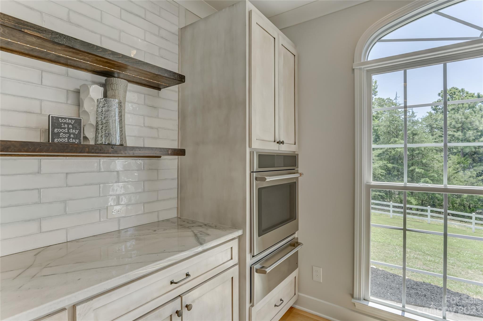 2354 Vineyard Road Fort Mill, SC 29708 - Photo 34 of 48 a kitchen with a refrigerator and cabinets