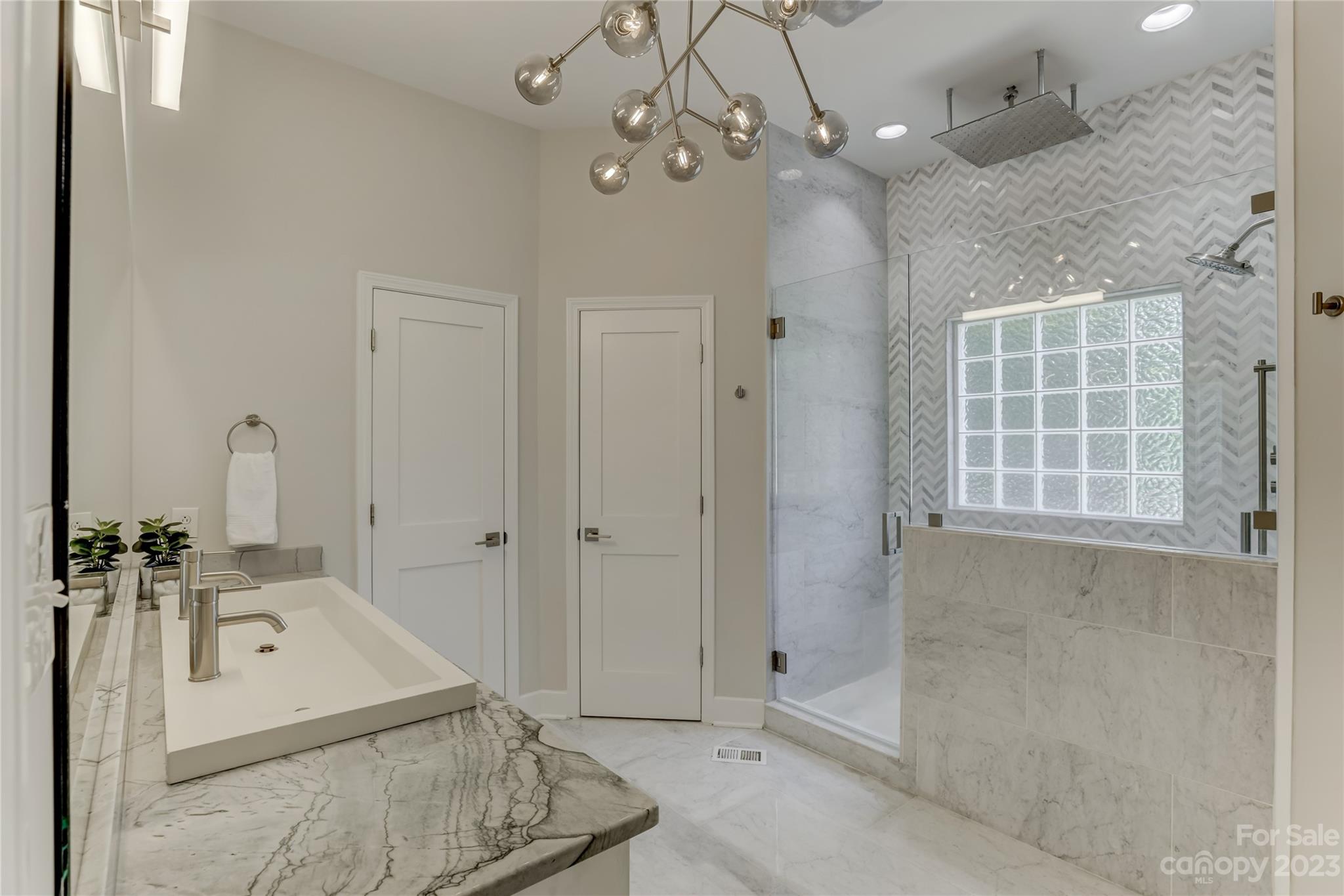 2354 Vineyard Road Fort Mill, SC 29708 - Photo 42 of 48 a bathroom with a sink a window and a mirror