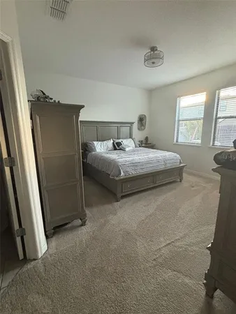a bathroom with a toilet and a sink