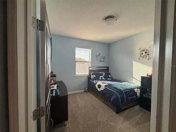 a bedroom with furniture and a equipment