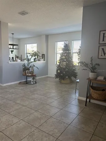 a view of a livingroom with furniture and window