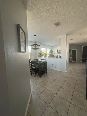 a bathroom with a sink a mirror and a shower