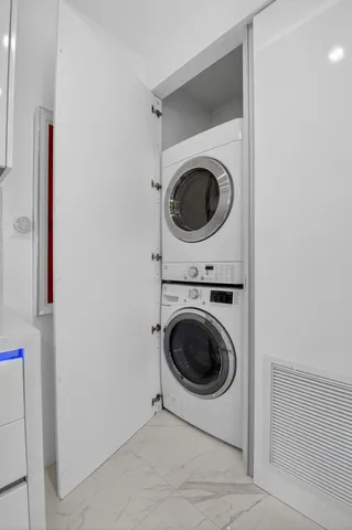 a bathroom with a shower and a toilet