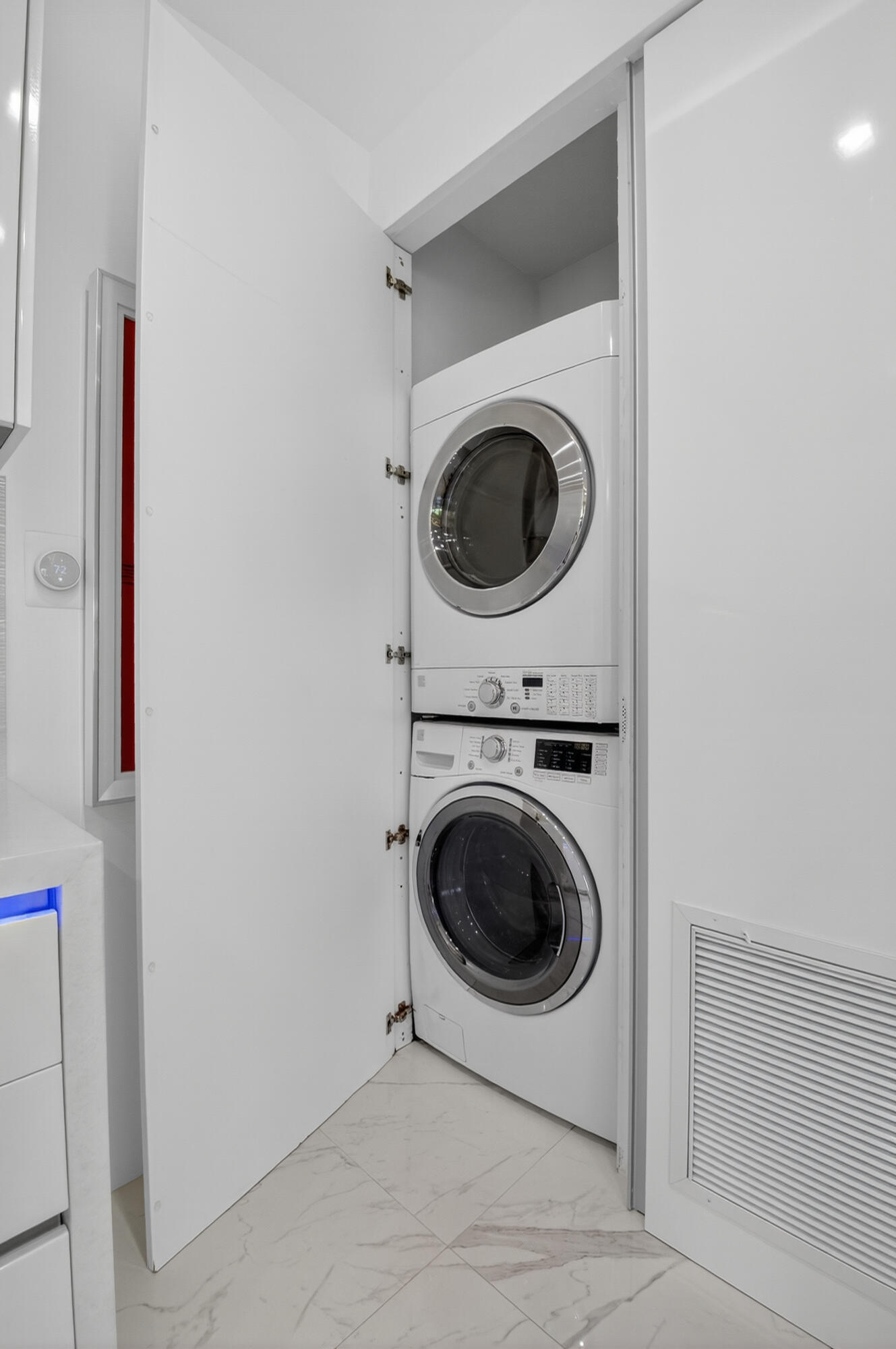 19297 Sabal Lake Drive, Unit 5072 Boca Raton, FL 33434 - Photo 17 of 59 a utility room with dryer and washer