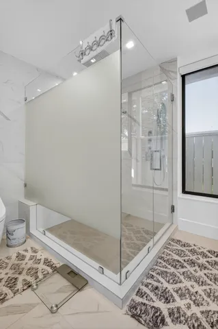 a view of a living room and a wooden floor