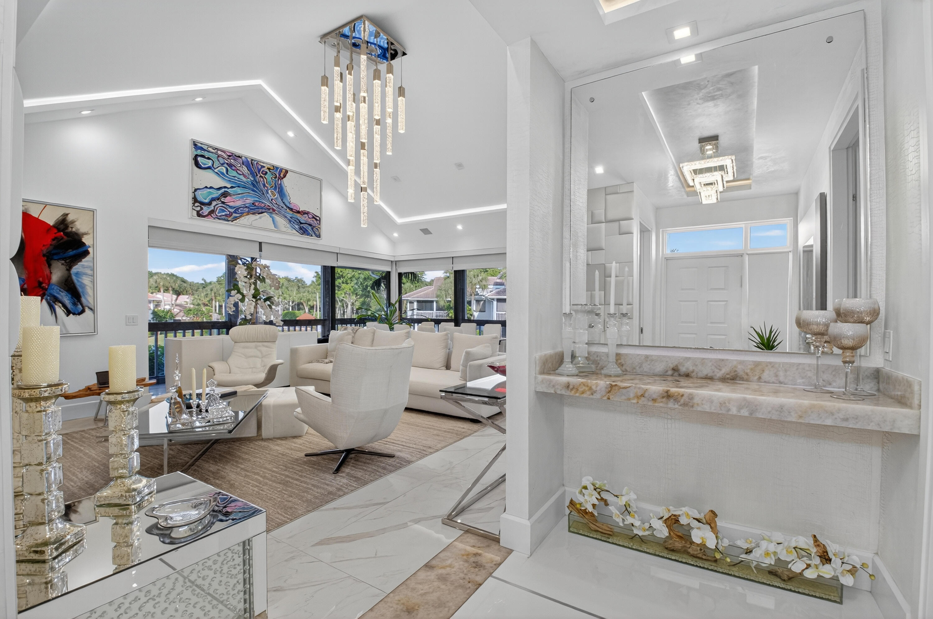 19297 Sabal Lake Drive, Unit 5072 Boca Raton, FL 33434 - Photo 9 of 59 a living room with furniture flowerpot and a chandelier
