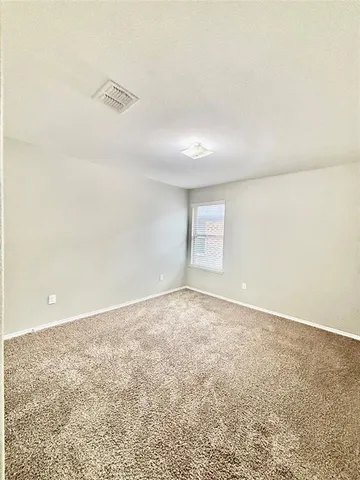 en empty room with windows