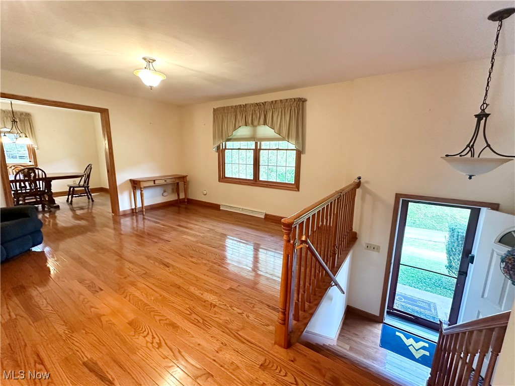4461 Cross Creek Road Colliers, WV 26035 - Photo 5 of 33 Living room featuring light wood finished floors