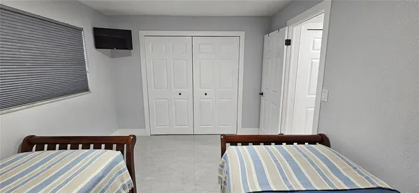 a view of a room with staircase and windows