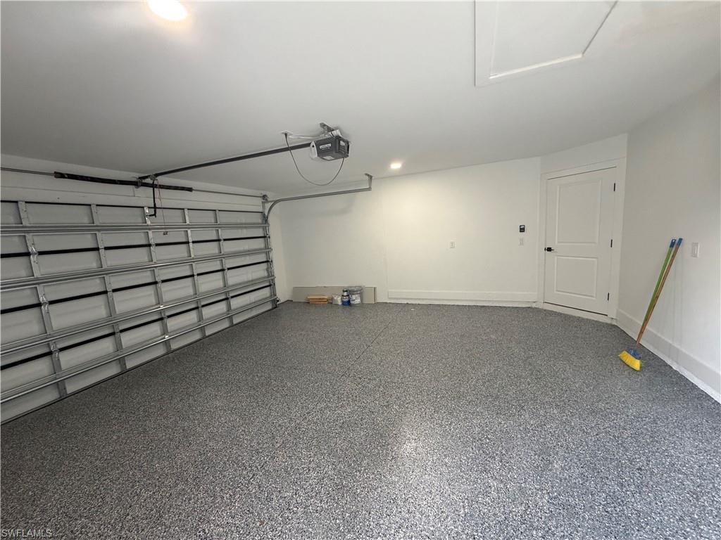 15 Louisiana Road Lehigh Acres, FL 33936 - Photo 11 of 22 a view of a garage