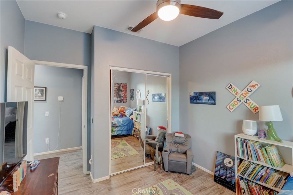 1667 Constant Trail San Jacinto, CA 92582 - Photo 23 of 44 a view of a livingroom with baby furniture