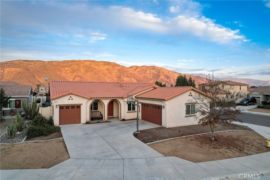 1667 Constant Trail San Jacinto, CA 92582 - Photo 34 of 44 a view of a white house with a yard