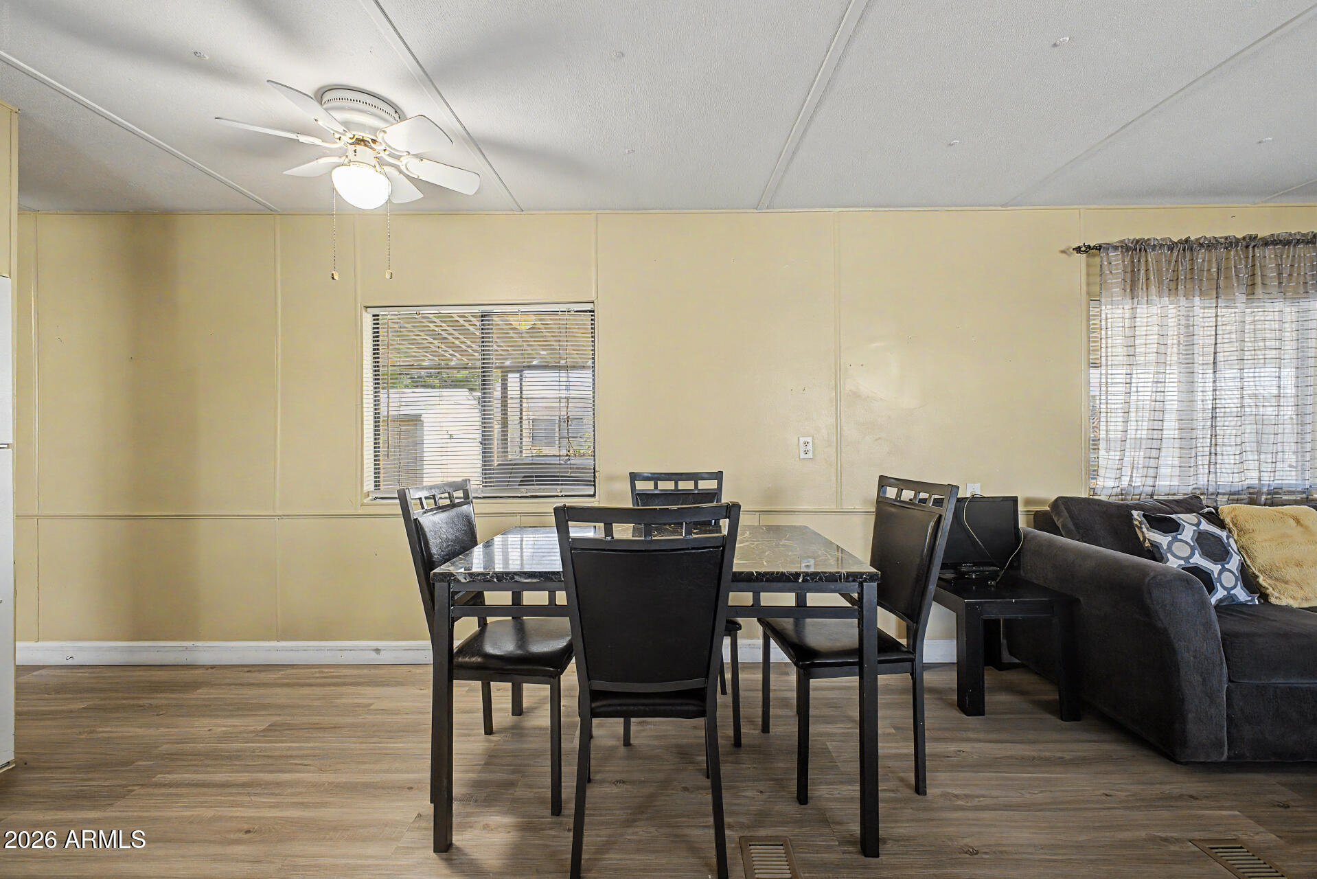 535 South Alma School Road, Unit 40 Mesa, AZ 85210 - Photo 12 of 33 a view of a dining room with furniture window and outside view