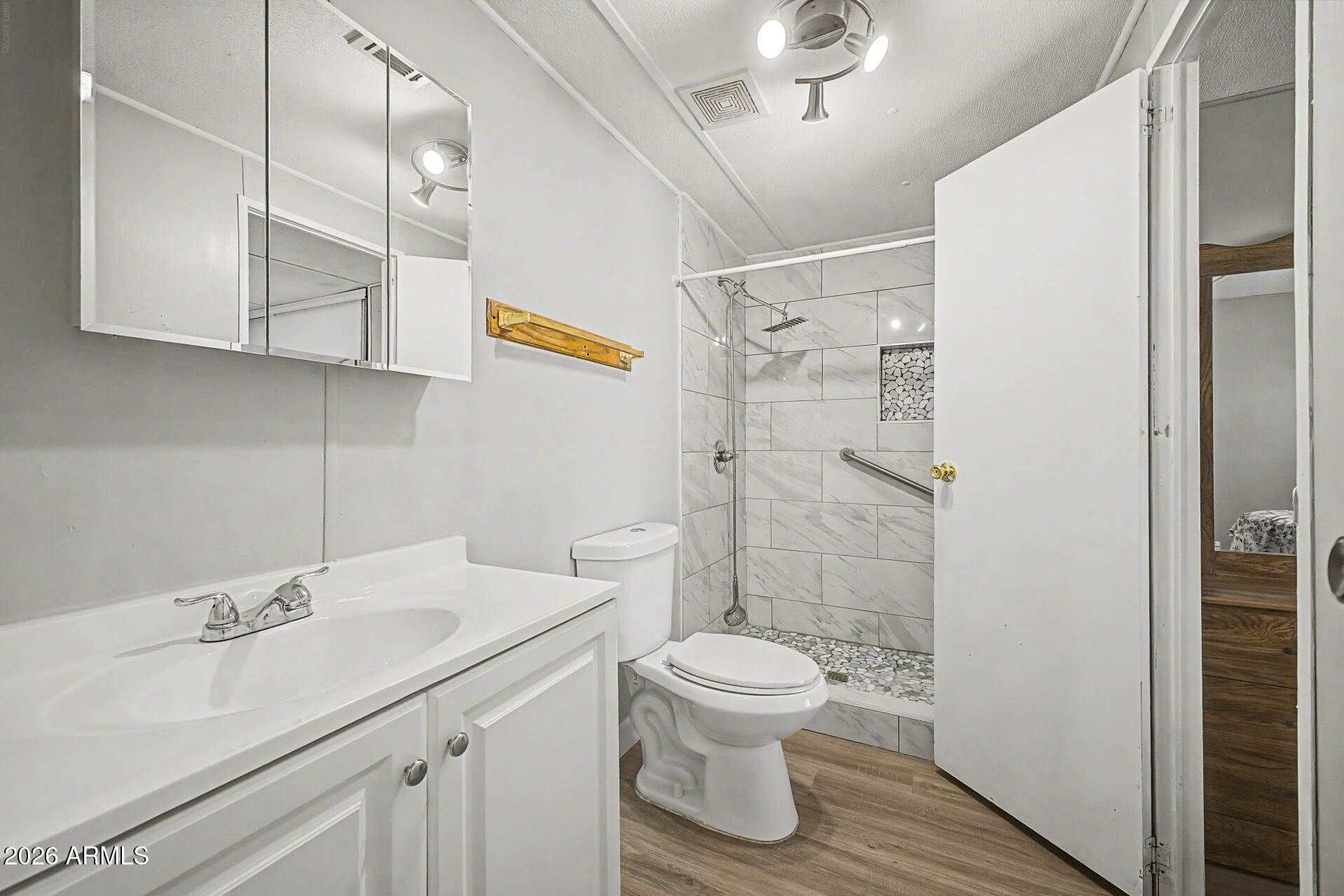 535 South Alma School Road, Unit 40 Mesa, AZ 85210 - Photo 21 of 33 a bathroom with a sink toilet and shower