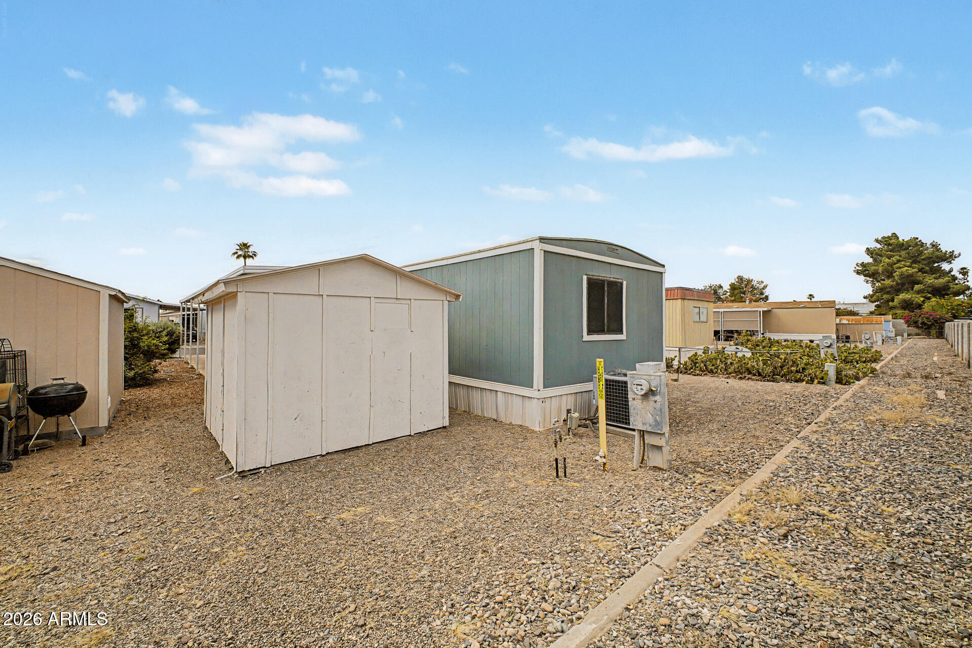 535 South Alma School Road, Unit 40 Mesa, AZ 85210 - Photo 29 of 33 a view of a house with backyard and sitting area