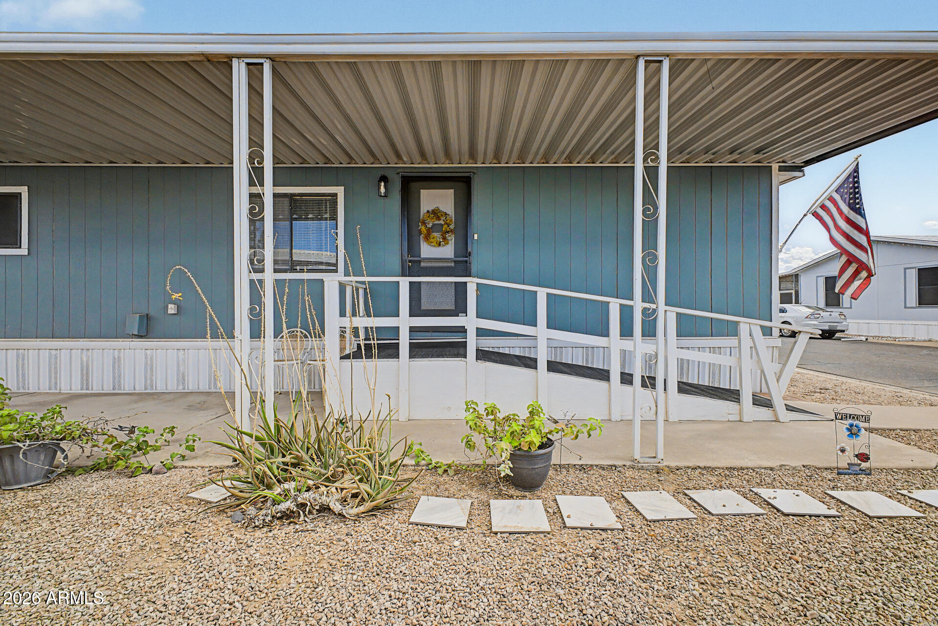 535 South Alma School Road, Unit 40 Mesa, AZ 85210 - Photo 6 of 33 a front view of a house with a garden