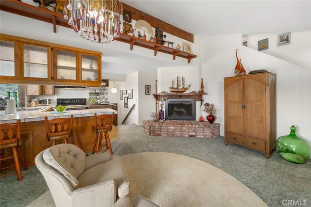 a kitchen with a sink cabinets and window