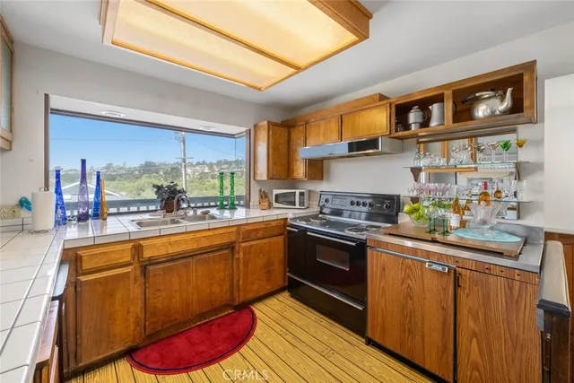 a bedroom with a bed and a mirror