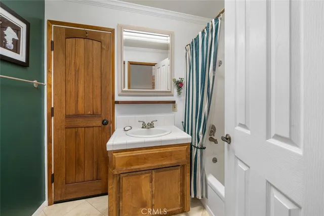 a kitchen with a sink and a microwave