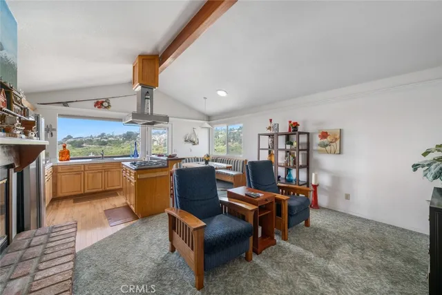a kitchen with stainless steel appliances granite countertop a stove and a refrigerator