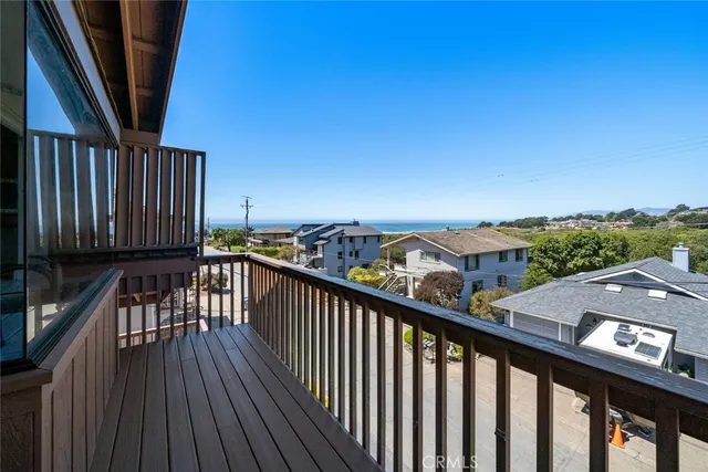 a view of room with window and cabinet