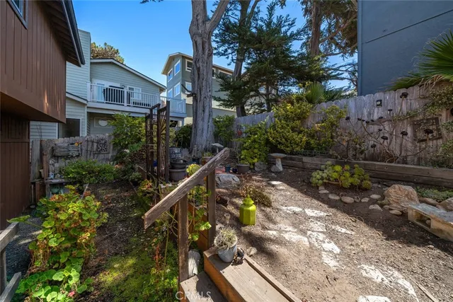 an aerial view of house with yard