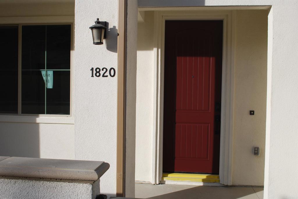 1820 Red Willow Way Oceanside, CA 92056 - Photo 1 of 1 a view of a door and an empty room