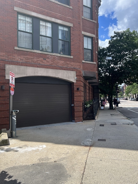 75 Clarendon Street, Unit 47G Boston, MA 02116 - Photo 2 of 3 a front view of a building with a yard