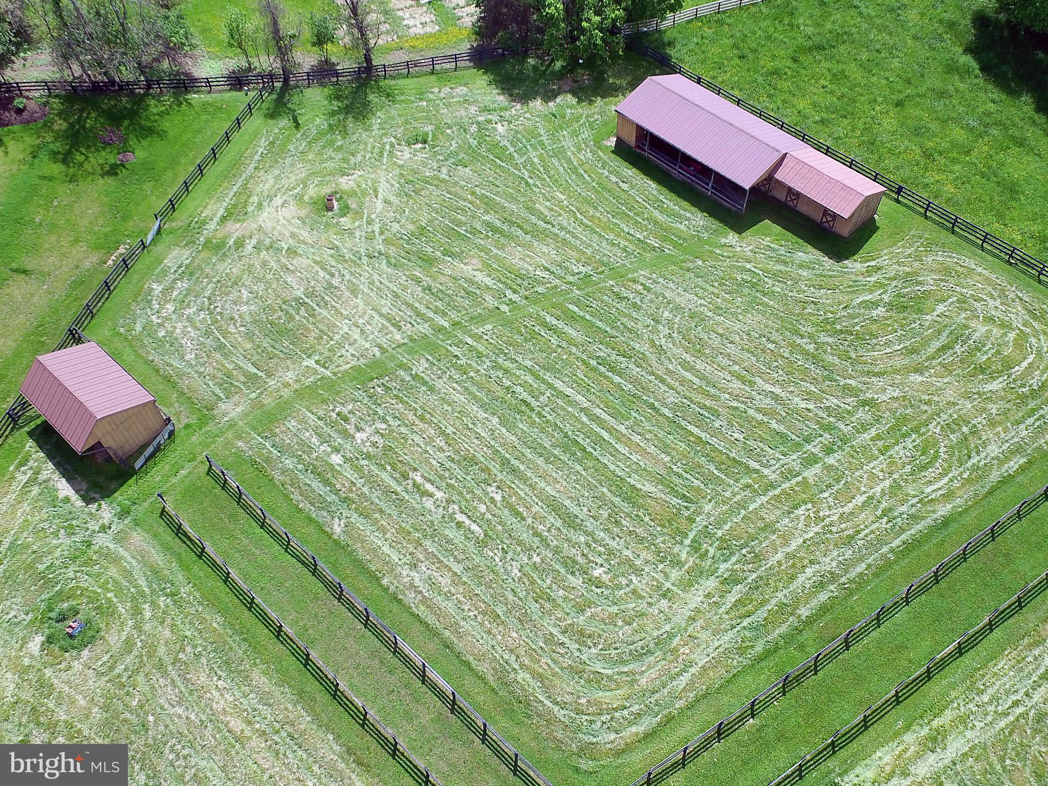 23387 Mersey Road Middleburg, VA 20117 - Photo 24 of 30 View of barn, fenced paddocks and turn out shed