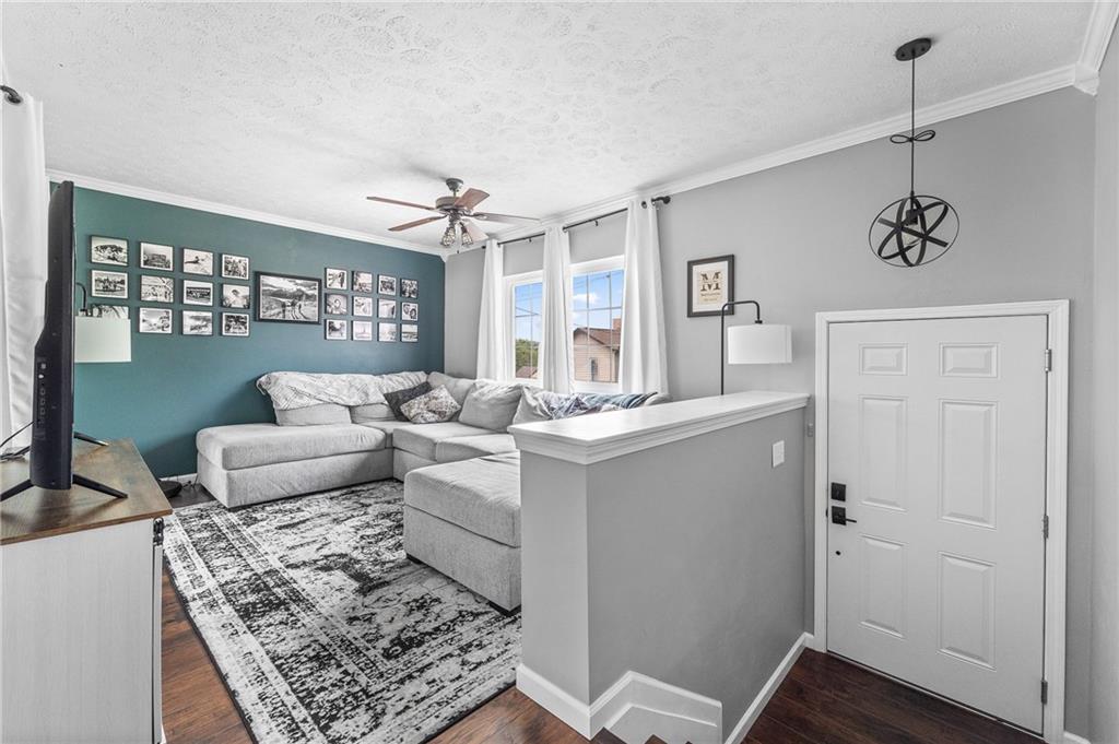 604 Lincoln Street Rochester, PA 15074 - Photo 2 of 23 a living room with furniture and window