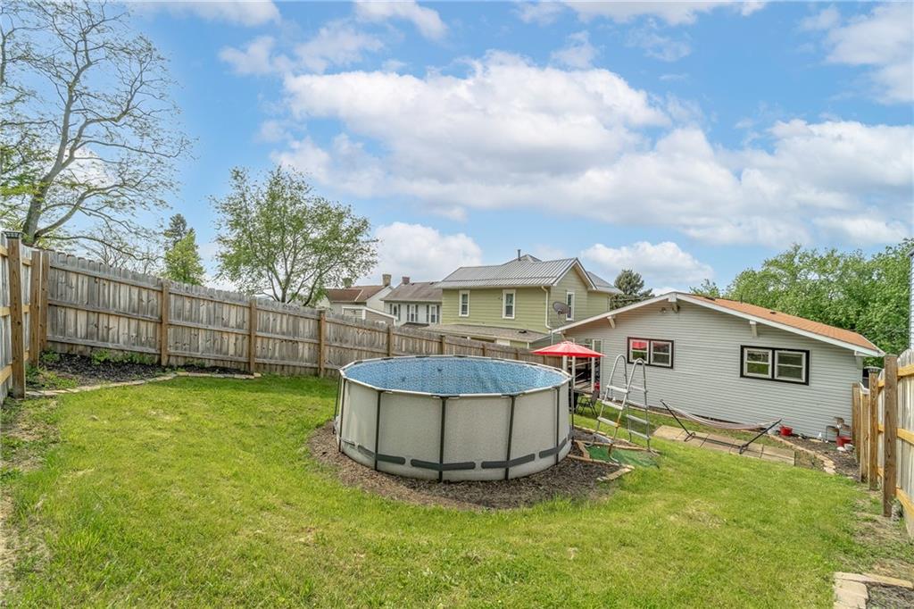 604 Lincoln Street Rochester, PA 15074 - Photo 22 of 23 a view of a house with backyard and garden