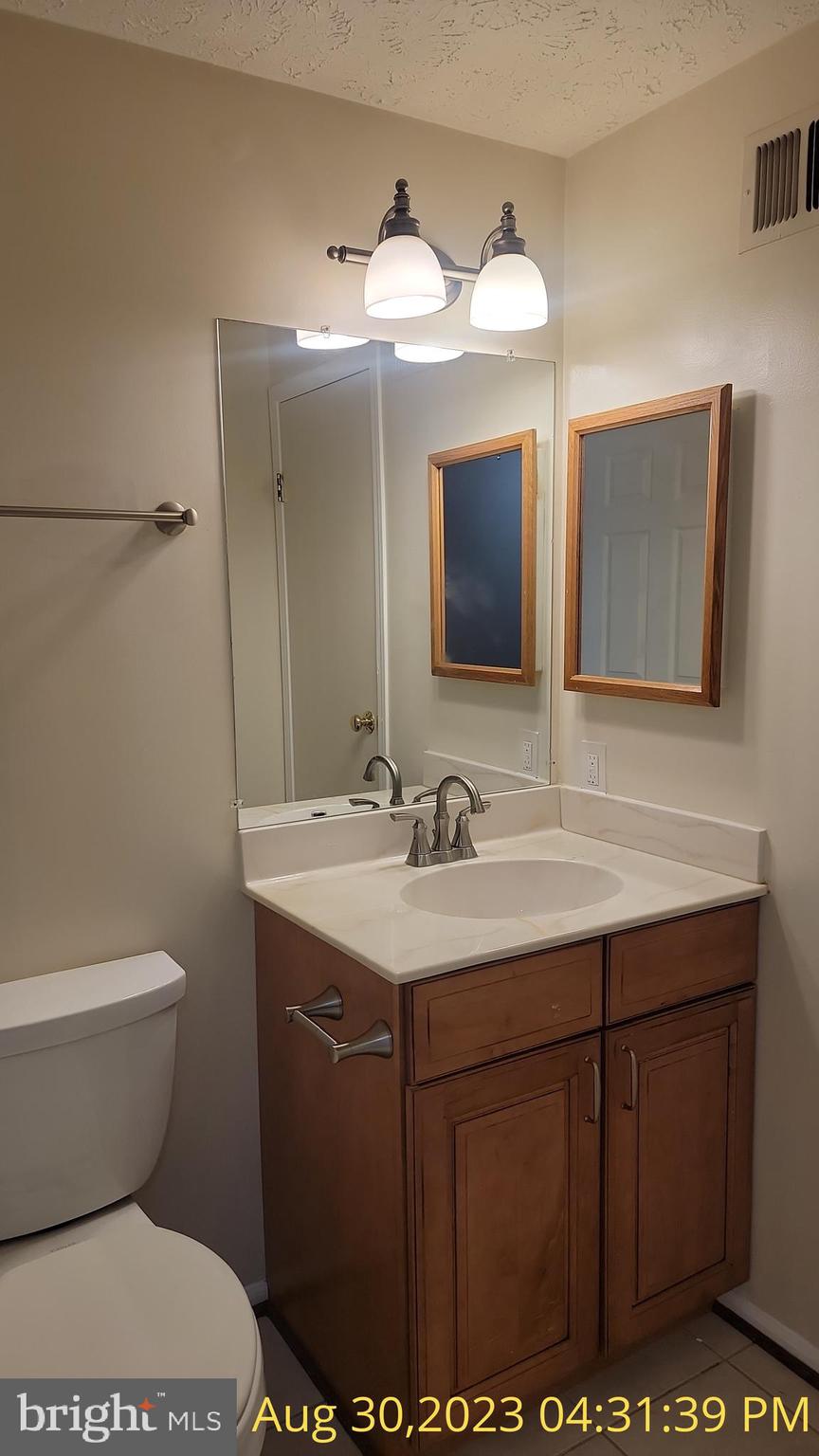 7475 Lone Star Road Lorton, VA 22079 - Photo 11 of 14 Hall Bathroom